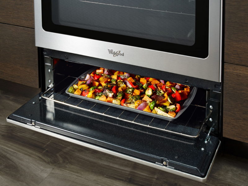 Vegetables roasting in under-oven broiling drawer